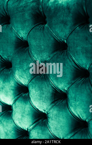 Furniture design, classic interior and royal vintage material concept - Emerald luxury velour quilted sofa upholstery with buttons, elegant green home Stock Photo