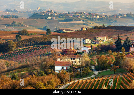 Colorful autumnal vineyards on the hills of Langhe near La Morra in Piedmont, Northern Italy. Stock Photo