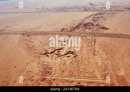 aerial view of highway road in desert Stock Photo