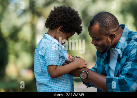 Side Profile Of A Sad Man With Hands On Face Looking Down. Depression And  Anxiety Disorder Concept Stock Photo, Picture and Royalty Free Image. Image  89272898.