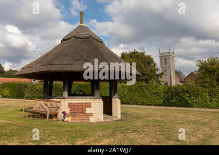 The Well on the green in Woodbastick village in Norfolk Stock Photo