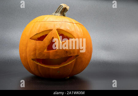 Jack o Lantern Halloween pumpkin grinning friendly Stock Photo