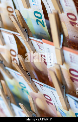 EURO banknotes, bills on a clothesline Stock Photo