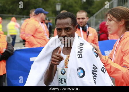 09/19/2019, Berlin, Germany, Kenenisa Bekele after the finish Kenenisa Bekele from Ethiopia wins the 46th Berlin Marathon in 02:01:41 hours. Birhanu Legese (2:02:48) wins the second place and Sisay Lemma (2:03:36) comes in third place. Stock Photo