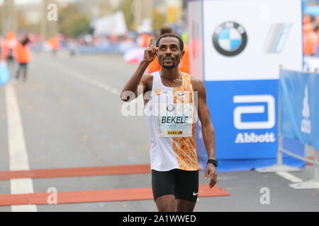 09/19/2019, Berlin, Germany, Kenenisa Bekele at the finish Kenenisa Bekele from Ethiopia wins the 46th Berlin Marathon in 02:01:41 hours. Birhanu Legese (2:02:48) wins the second place and Sisay Lemma (2:03:36) comes in third place. Stock Photo