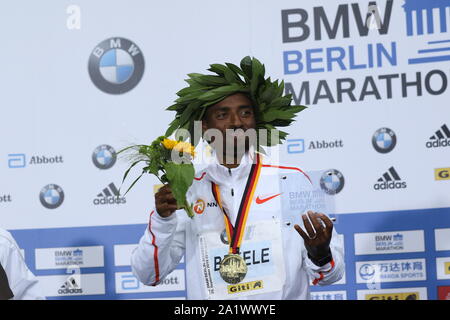 09/19/2019, Berlin, Germany, Kenenisa Bekele at the award ceremony. Kenenisa Bekele from Ethiopia wins the 46th Berlin Marathon in 02:01:41 hours. Birhanu Legese (2:02:48) wins the second place and Sisay Lemma (2:03:36) comes in third place. Stock Photo