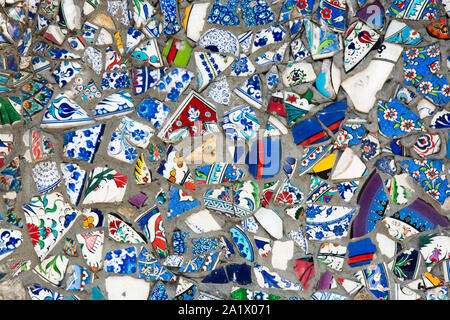 Multicolor mosaic wall decorative ornament from ceramic broken tile Stock Photo
