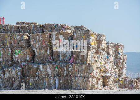 Waste paper is collected and packed for recycling. Cardboard and Paper Recycling Stock Photo