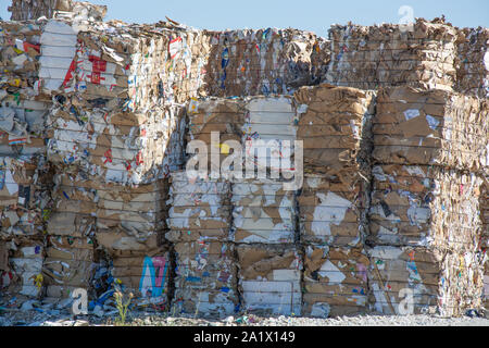 Waste paper is collected and packed for recycling. Cardboard and Paper Recycling Stock Photo