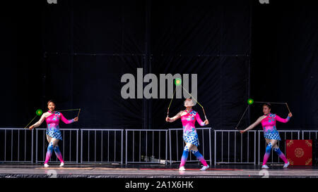 Doswell, Virginia, USA — September 27, 2019. Chinese acrobats perform on the main stage at the Virginia State fair. Stock Photo