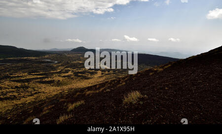 Picture taken from Silvestri craters on the southern slope of the Etna volcano. Stock Photo