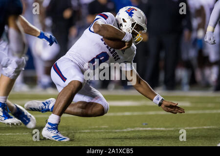 Overtime. 28th Sep, 2019. Louisiana Tech Bulldogs quarterback J'Mar Smith (8) carries the ball during the overtime period of an NCAA football game between the Louisiana Tech Bulldogs and the Rice Owls at Rice Stadium in Houston, TX. Louisiana Tech won the game 23 to 20 in overtime.Trask Smith/CSM/Alamy Live News Stock Photo