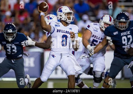 Overtime. 28th Sep, 2019. Louisiana Tech Bulldogs quarterback J'Mar Smith (8) throws a pass during the 3rd quarter of an NCAA football game between the Louisiana Tech Bulldogs and the Rice Owls at Rice Stadium in Houston, TX. Louisiana Tech won the game 23 to 20 in overtime.Trask Smith/CSM/Alamy Live News Stock Photo