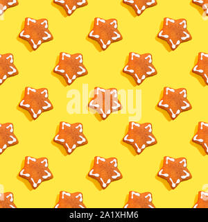 Many of cookies on yellow background. Gingerbread in shape of Christmas star. Many sweets cookie seamless pattern. New Year Xmas and food concept Stock Photo