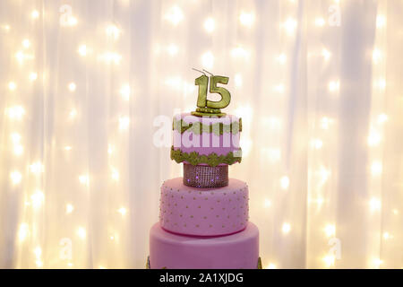Pink party cake, 15th birthday, with golden number fifteen, pink cake, 15 year old birthday cake Stock Photo