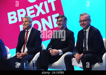 Manchester, England. 29th September, 2019  (L-R) Steve Barclay MP, Secretary of State for Exiting the European Union, Jacob Rees-Mogg MP, Leader of the House of Commons and Lord President of the Council and Michael Gove MP, Chancellor of the Duchy of Lancaster, taking part in a panel discussion on the subject of Brexit, on the first day of the Conservative Party Conference at the Manchester Central Convention Complex.  Kevin Hayes/Alamy Live News Stock Photo