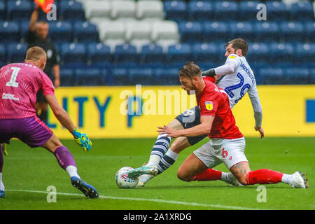 28th September 2019, Deepdale, Preston, England; Sky Bet Championship, Preston North End v Bristol City : Tom Barkhuizen (29) of Preston North End is taken down in the penalty area by Nathan Baker (6) of Bristol City Credit: Craig Milner/News Images