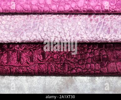 Colorful detailed fabric textures of different cloth types in a close up view Stock Photo