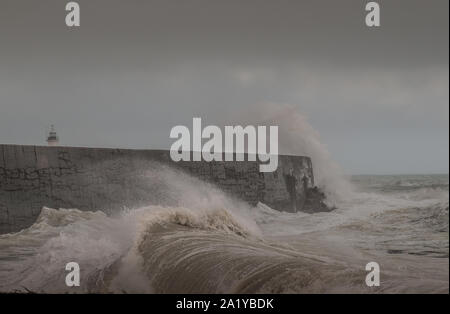 Newhaven, East Sussex, UK. 29th September 2019..Very strong South Westerly wind whips up the waves in the English Channel creating some spectacular scenes. Stock Photo