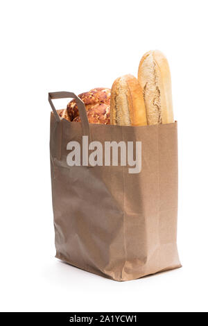paper bag with different kind of bread isolated on white background ...