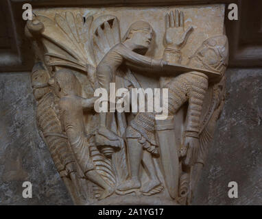 David slaying Goliath depicted in the Romanesque capital dated from the 12th century in the Basilica of Saint Mary Magdalene (Basilique Sainte-Marie-Madeleine de Vézelay) of the Vézelay Abbey (Abbaye Sainte-Marie-Madeleine de Vézelay) in Vézelay, Burgundy, France. Stock Photo