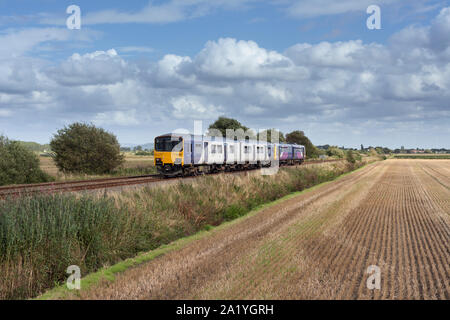 Arriva Northern rail class 150 sprinter train + class 142 pacer passing Drummersdale on the Southport line Stock Photo