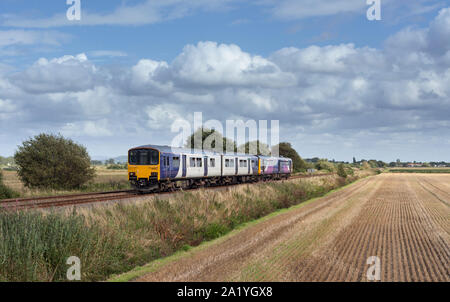 Arriva Northern rail class 150 sprinter train + class 142 pacer passing Drummersdale on the Southport line Stock Photo