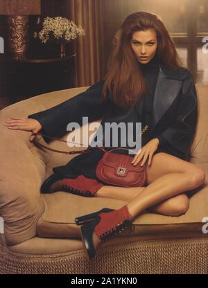 poster advertising Bally fashion house with Karlie Kloss in paper magazine from 2011 year, advertisement, creative Bally advert from 2010s Stock Photo