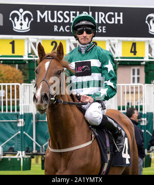 Jockey Daniel Tudhope on Lara Silvia, winner of the Every Race Live On RacingTV Nursery Handicap at Musselburgh Racecourse - 29th September 2019. Stock Photo