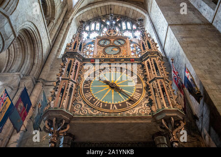 An ornate and detailed clock within Durham Cathedral, Durham UK Stock Photo