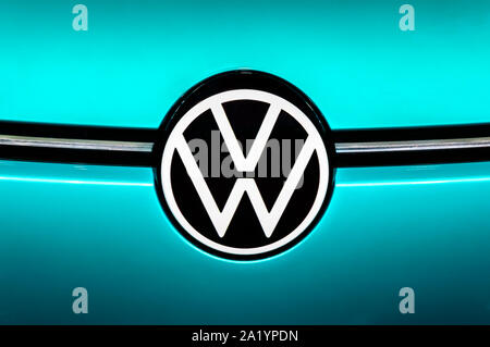 FRANKFURT - SEP 15, 2019: New two-dimensional Volkswagen VW logo for electric cars on VW ID.3 metallic on green mint car background at IAA 2019 Stock Photo