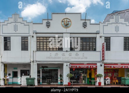 Singapore - March 22, 2019: Chinatown. Historic building of Oversea Chinese Banking Corporation Limited in South Bridge Road has also retail stores on Stock Photo