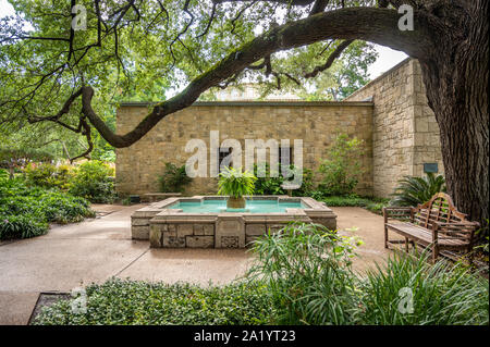 A fountain dedicated to Davy Crockett in the courtyard of The Alamo, San Antonio, Texas. Stock Photo