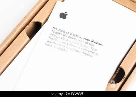 Vidalia, Georgia / USA - September 27, 2019: Close-up studio shot of Apple’s mailing package box for iPhone trade-in program set on white background. Stock Photo