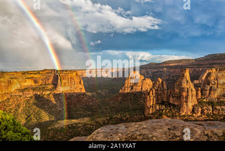 A double rainbow after a storm in Monument Canyon in Colorado National Monument in Fruita, Colorado. Stock Photo