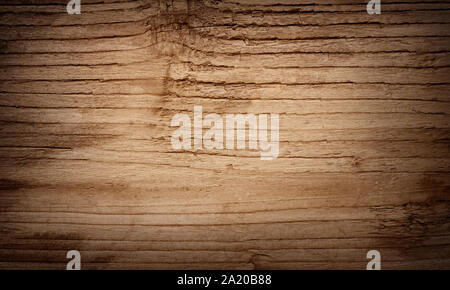 Dark brown scratched wooden cutting, chopping board. Wood texture Stock Photo