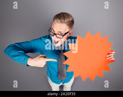 Salesman presenting empty panel with space for advertising. Stock Photo