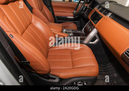 Novosibirsk, Russia - 08.01.2018: Handmade brown and beige leather headrest louis  vuitton for a car in a vehicle interior design workshop against the Stock  Photo - Alamy