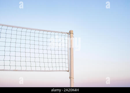 Beach volleyball net, summer vacation, sport concept. isolated sky background. Stock Photo