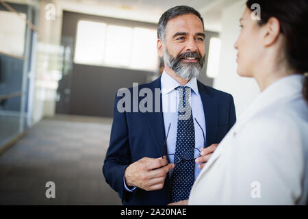 Portrait of architects having discussion in office Stock Photo