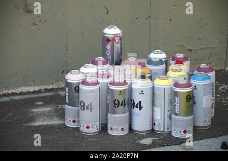 KHARKOV, UKRAINE - AUGUST 24, 2019: Montana mtn 94 and Kobra used spray cans for graffiti painting outdoors Stock Photo