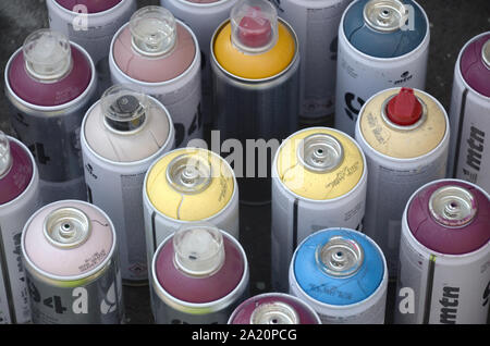 KHARKOV, UKRAINE - AUGUST 24, 2019: Montana mtn 94 and Kobra used spray cans for graffiti painting outdoors Stock Photo