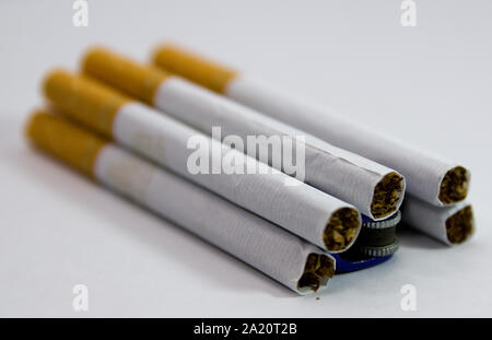 opened-pack cigarettes and lighter close up Stock Photo