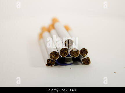 opened-pack cigarettes and lighter close up Stock Photo