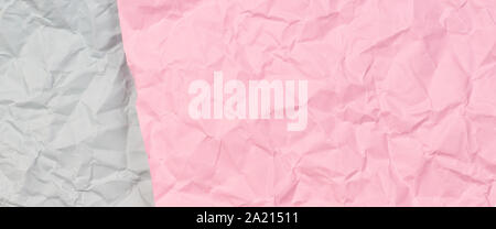Pastel pink and light grey crumpled wrinkled paper texture background Stock Photo
