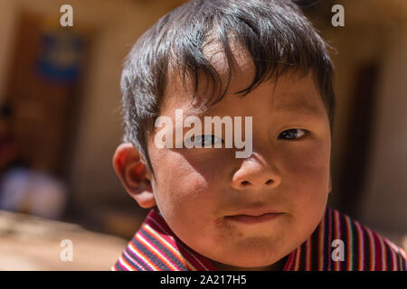 Young boy, aged 4 to 6 at a touristic event in the indigenous village of Puka Puka near Tarabuco, Quechuan people, Sucre, Bolivia, Latin America Stock Photo