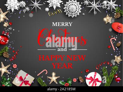 Festive dark card with Christmas decorations and balls, stars, gift boxes, fir tree branches. Winter holiday template with Merry Christmas lettering. Stock Vector