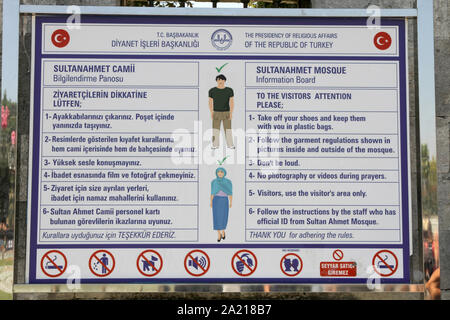 The Sultanahmet (Blue) Mosque rules and regulations sign by the Presidency of Religious Affairs of the Republic of Turkey, Fatih, Istanbul. Stock Photo