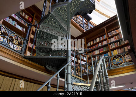 Liverpool Central Library, Liverpool, UK - beautiful traditional wood paneled library with spiral staircase Stock Photo
