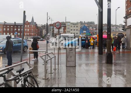 Cork, Ireland, 30th September 2019.   Yellow Weather Warning, Cork City. The status yellow weather warning for rain throughout the county didnt stop some shoppers from getting to the city today. The warning is in place till 4pm, this is ahead of Storm Lorenzo which may hit Thursday according to some forecasts.  Credit: Damian Coleman Stock Photo